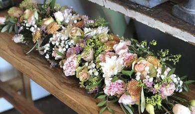 Blåveispiken Blomster AS