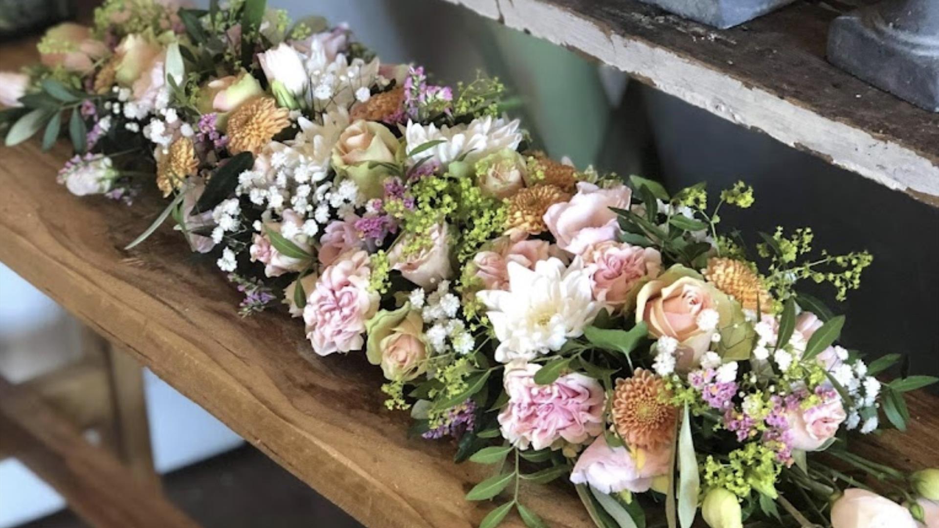 Blåveispiken Blomster AS